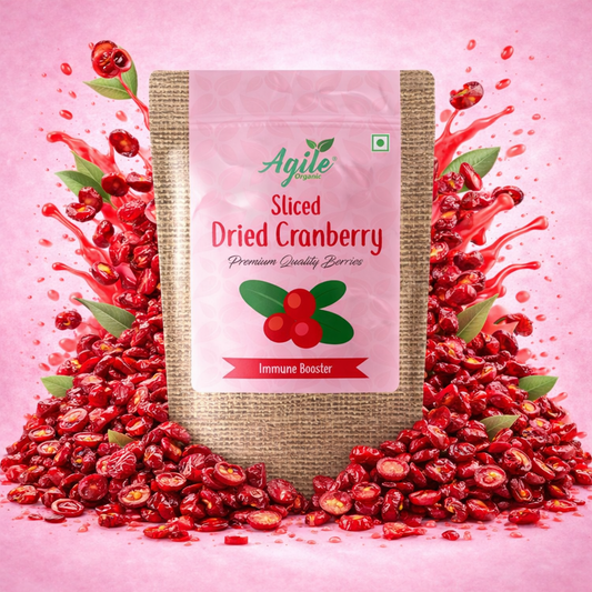 Bag of Agile Sliced Dried Cranberry on a pink background with cranberries around